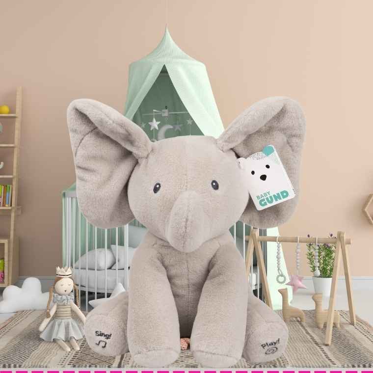 Gray stuffed animal designed for babies aged 0